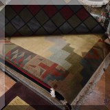 R72. Grometric pattern wool rug.